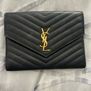YSL black leather clutch